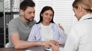 Couple discussing infertility despite normal fertility reports